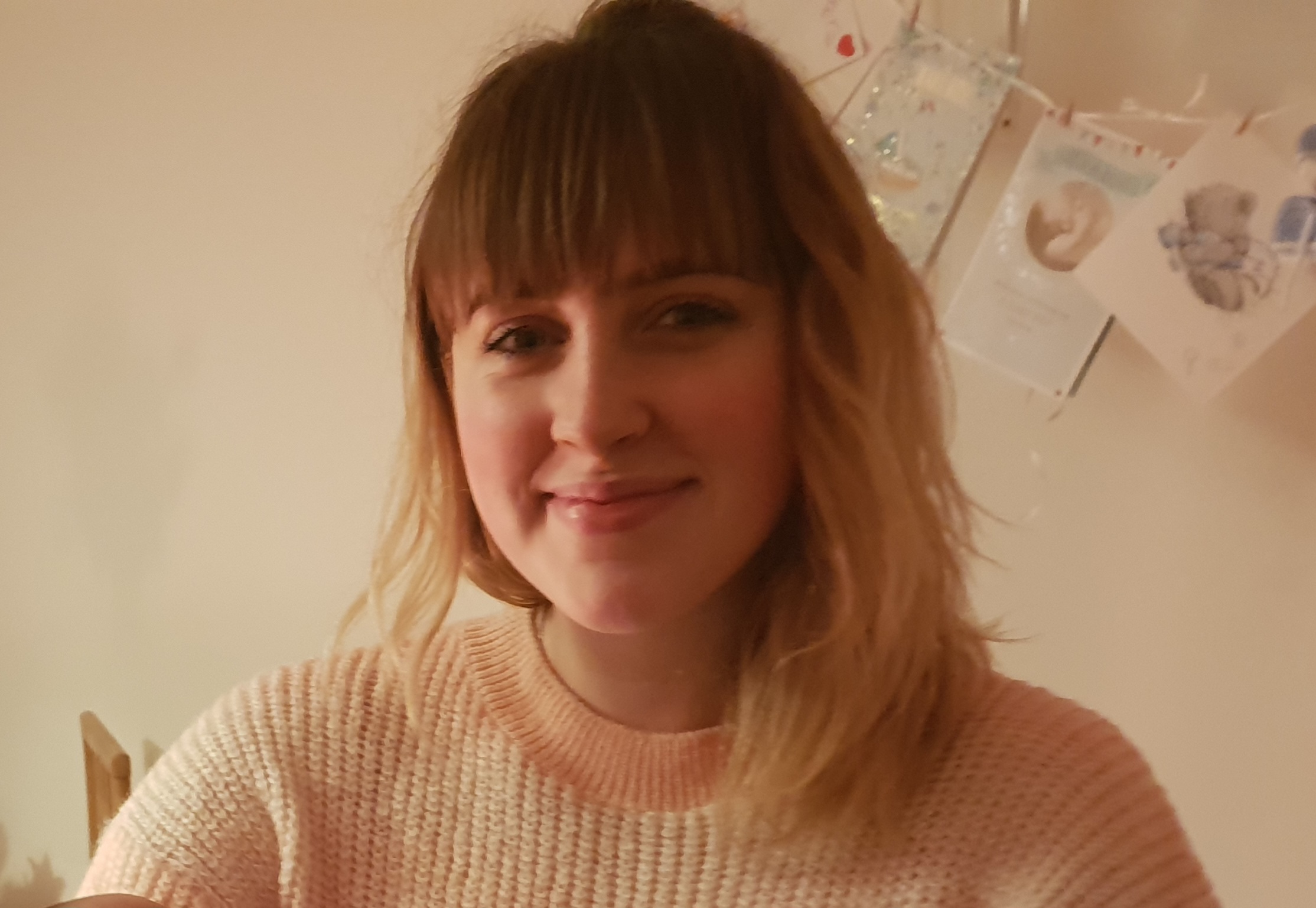 Photograph of Kerri O'Sullivan looking towards the camera and smiling